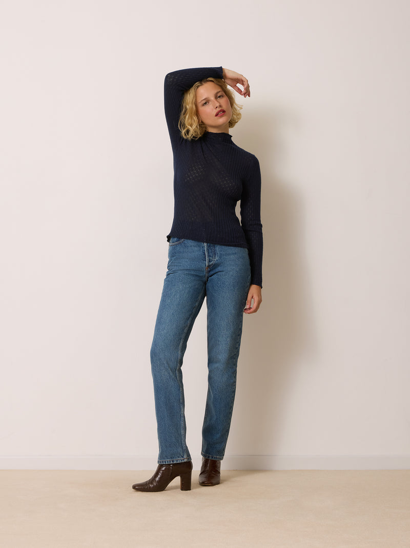 GALINA blue openwork turtleneck sweater, back view by Rouje