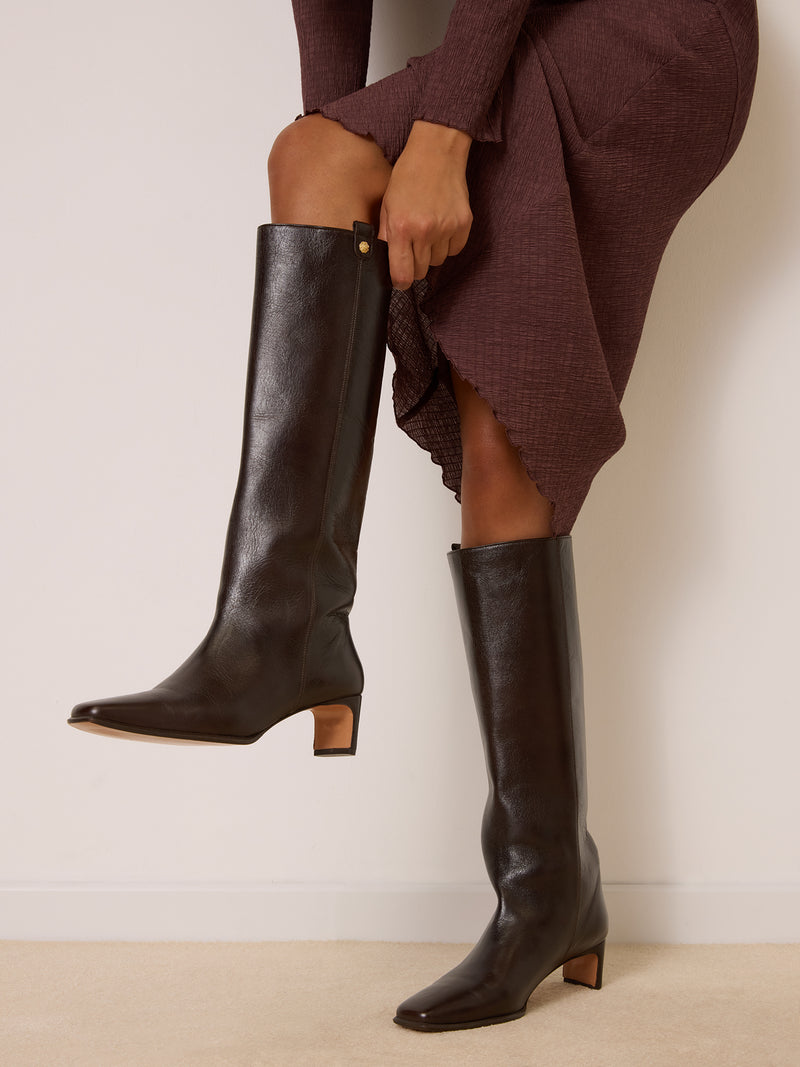 MAYFAIR ebony aged leather boots worn on a model by Rouje