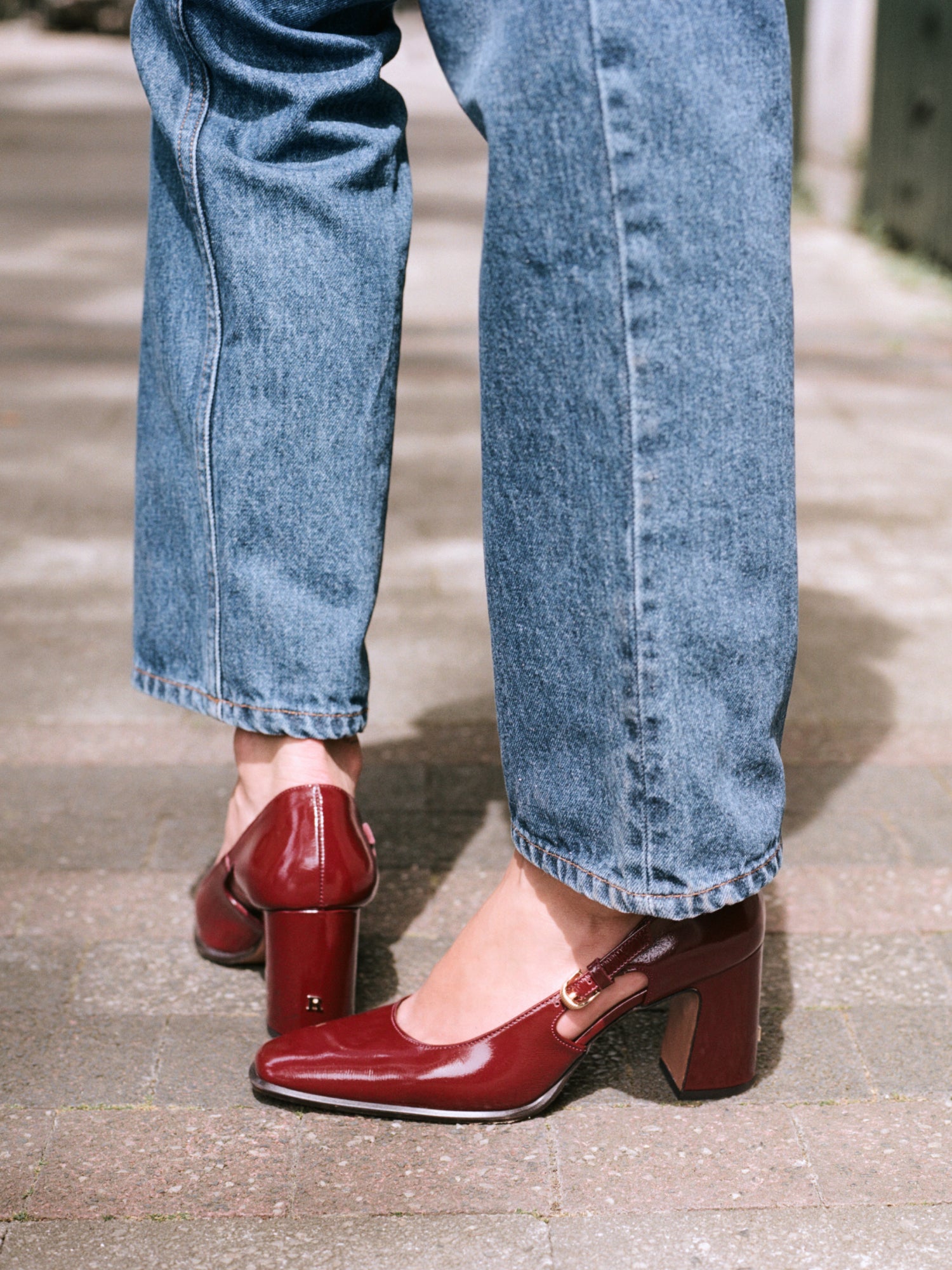 BRERA burgundy patent leather openwork pumps, lifestyle setting by Rouje